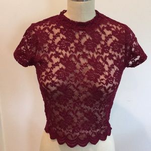 Cute burgundy stretch lace top with scallop hem